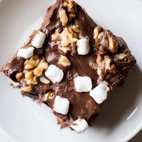 A close-up of finished Rocky Road Fudge, a delicious homemade treat ready to be enjoyed.