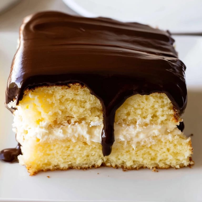 Savor the delicious details of this Ho Ho Cake, a classic American dessert perfect for any occasion.