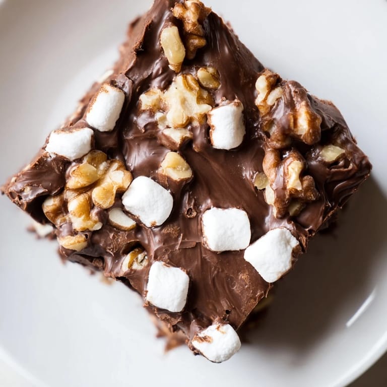 A close-up of finished Rocky Road Fudge, a delicious homemade treat ready to be enjoyed.