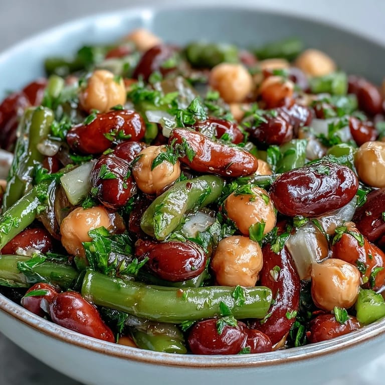 Hearty Three-Bean Salad, a refreshing, healthy, and satisfying side dish.